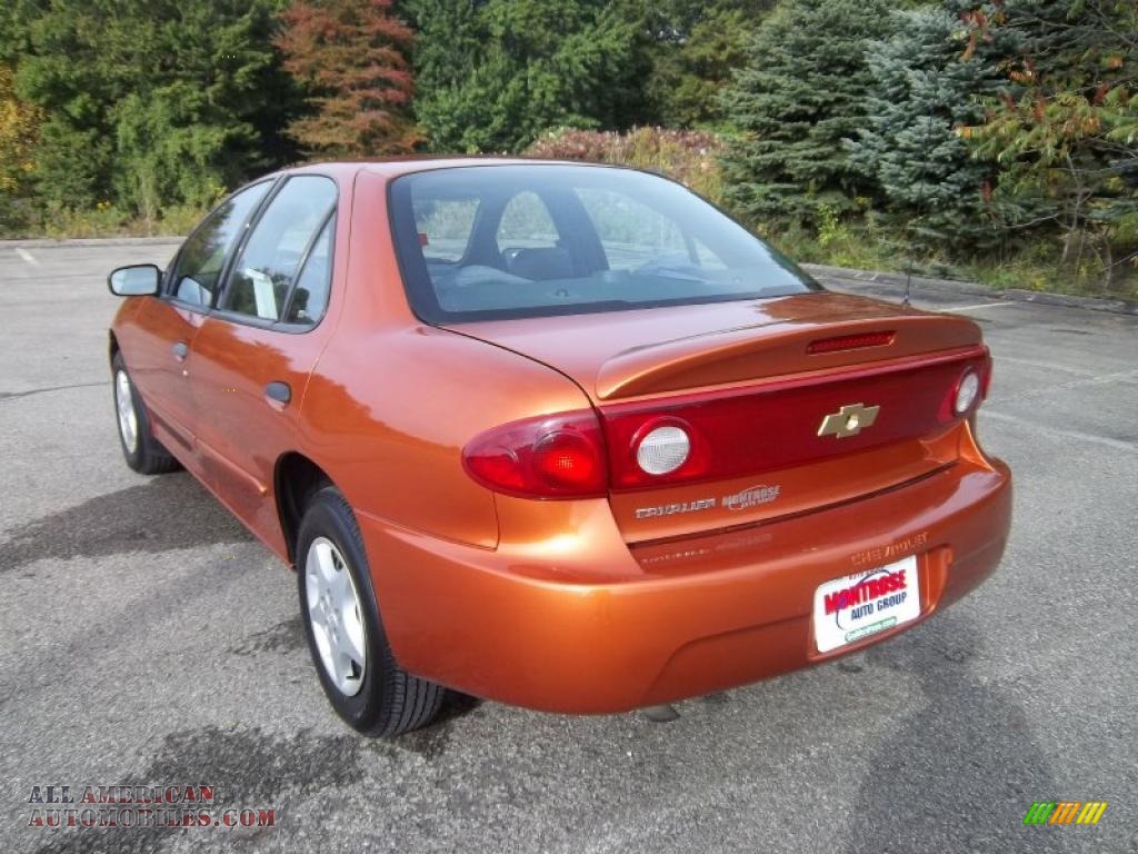 2005 Cavalier Sedan - Sunburst Orange Metallic / Graphite Gray photo #11
