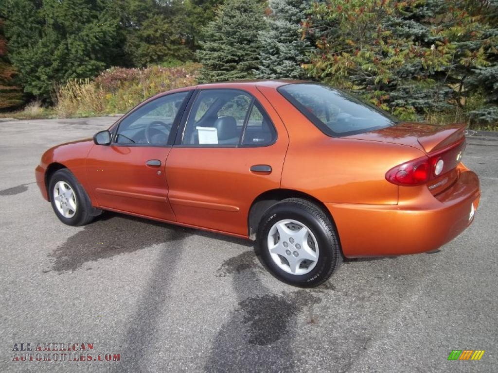 2005 Cavalier Sedan - Sunburst Orange Metallic / Graphite Gray photo #12