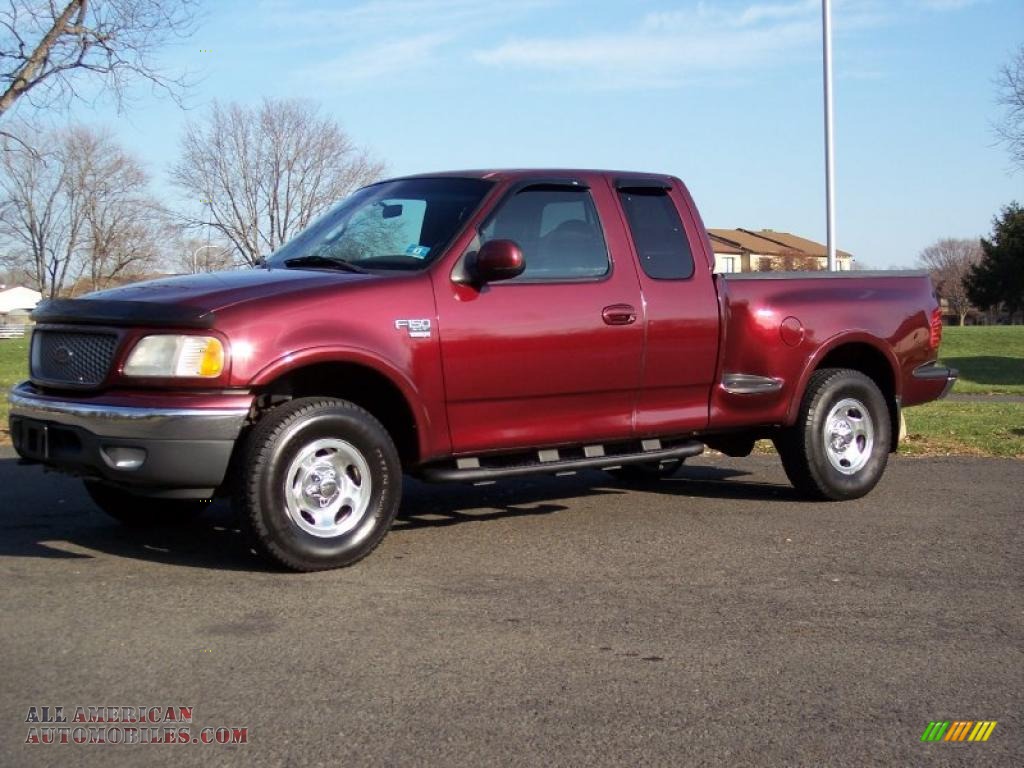 1999 Ford F150 XLT Extended Cab 4x4 In Dark Toreador Red Metallic Photo