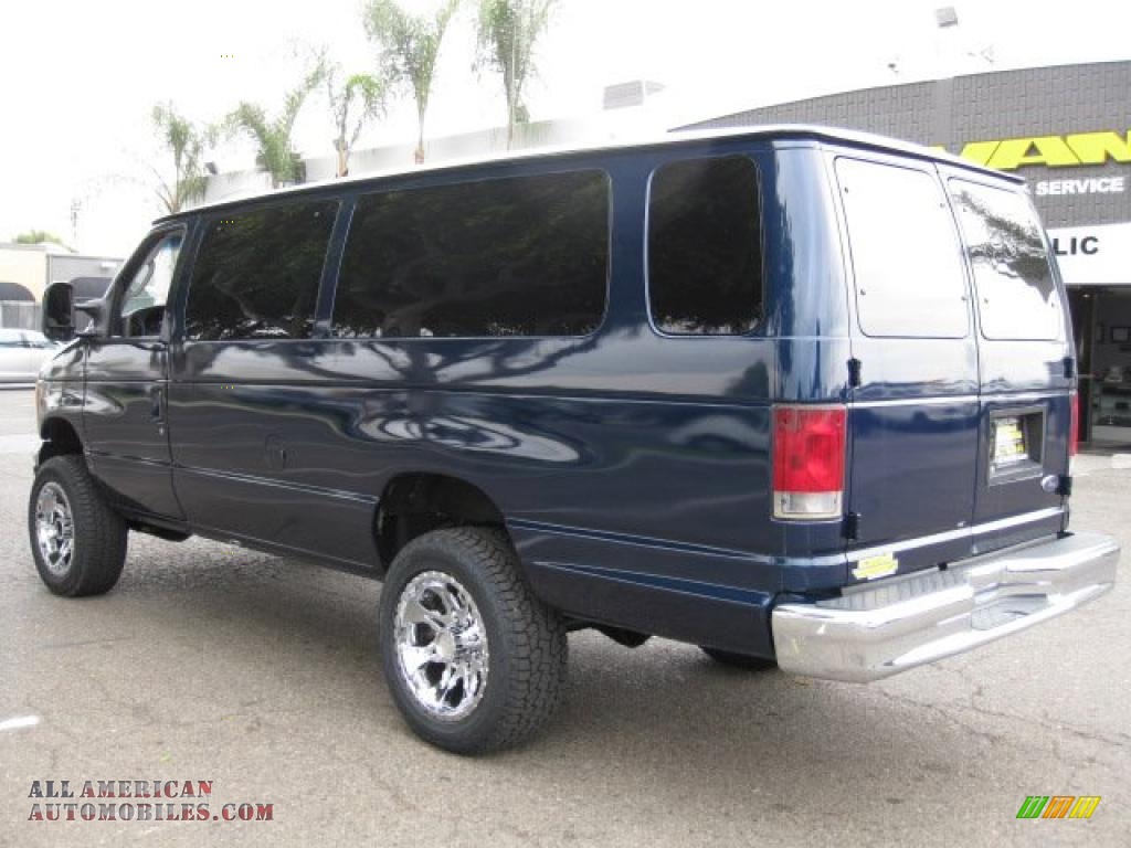 white ford passenger van