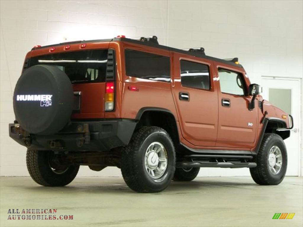 2003 Hummer H2 SUV in Sunset Orange Metallic photo 6 117975 All American Automobiles Buy