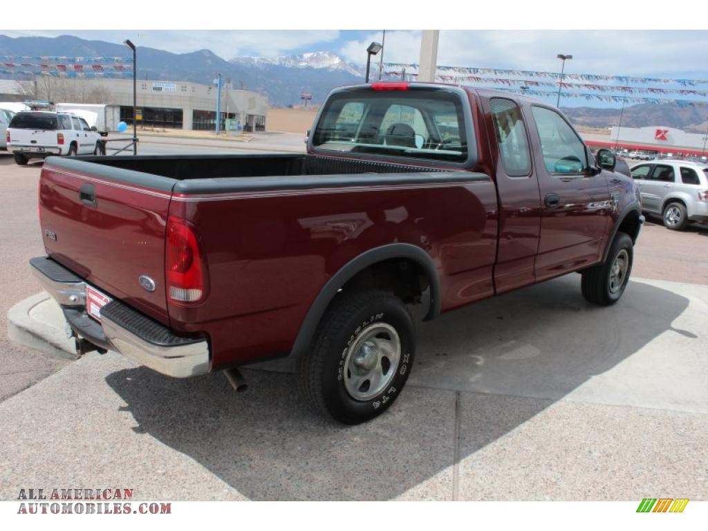 1998 Ford F150 XL SuperCab 4x4 in Dark Toreador Red Metallic photo #3