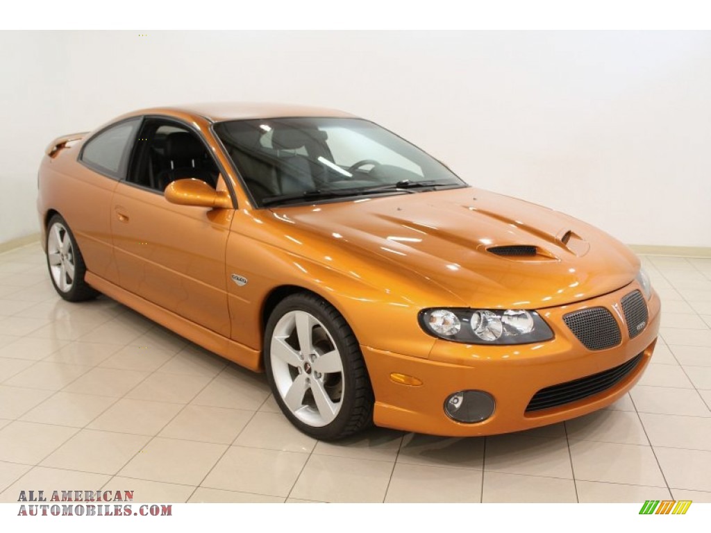Brazen Orange Metallic / Black Pontiac GTO Coupe