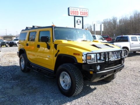 Yellow 2003 Hummer H2 SUV