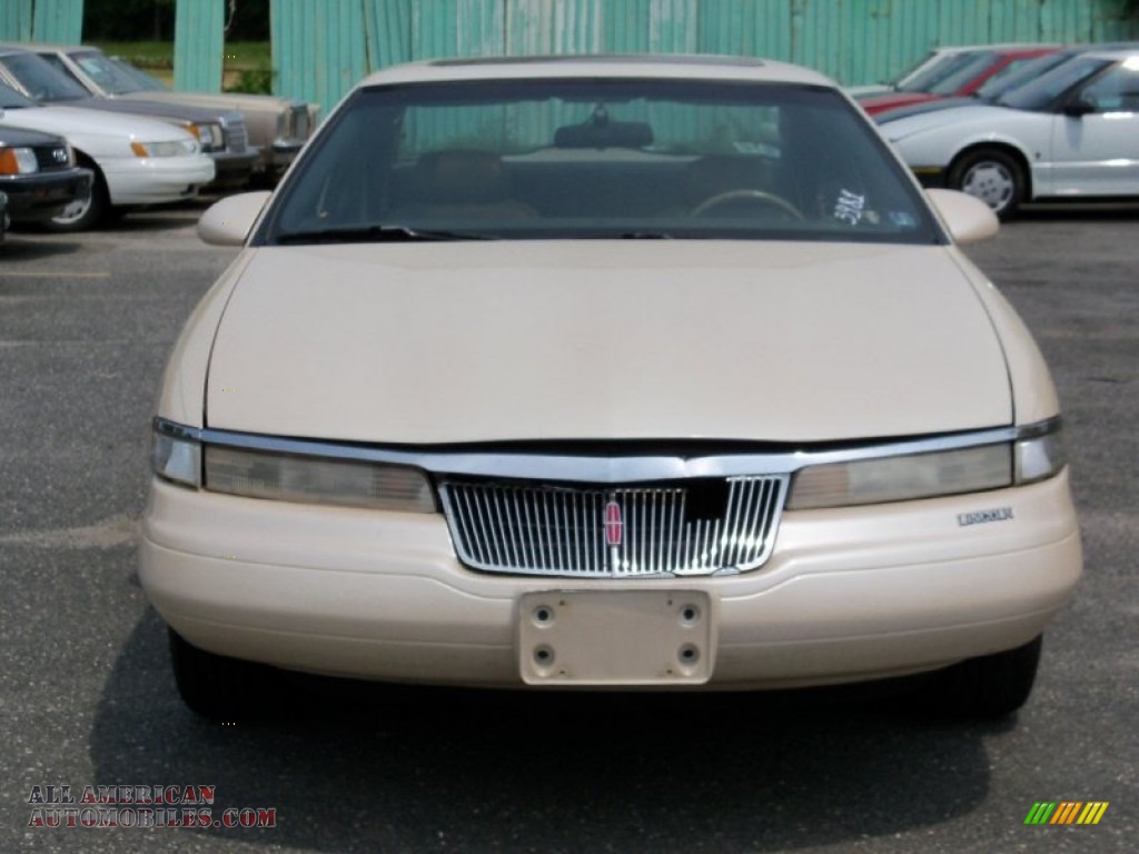 Ivory Pearl Metallic Tricoat / Dark Beige Lincoln Mark VIII LSC
