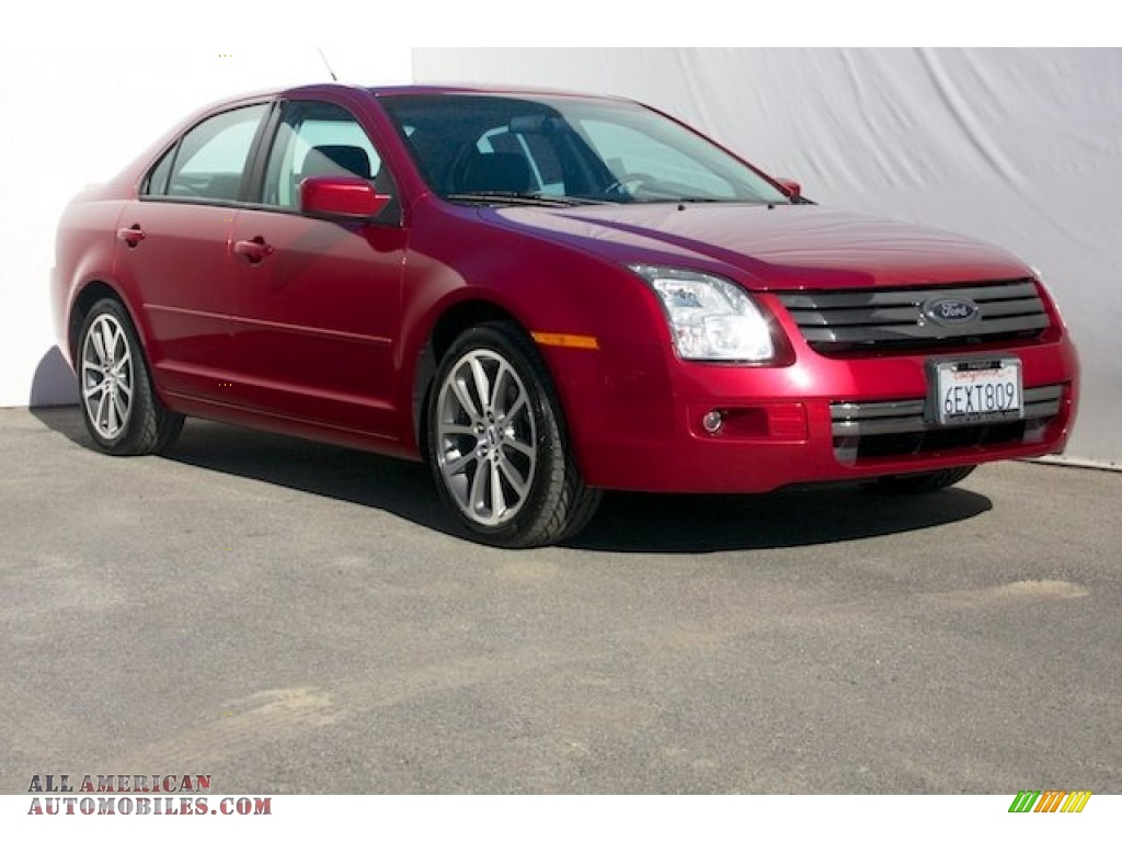 Redfire Metallic / Charcoal Black/Red Ford Fusion SE