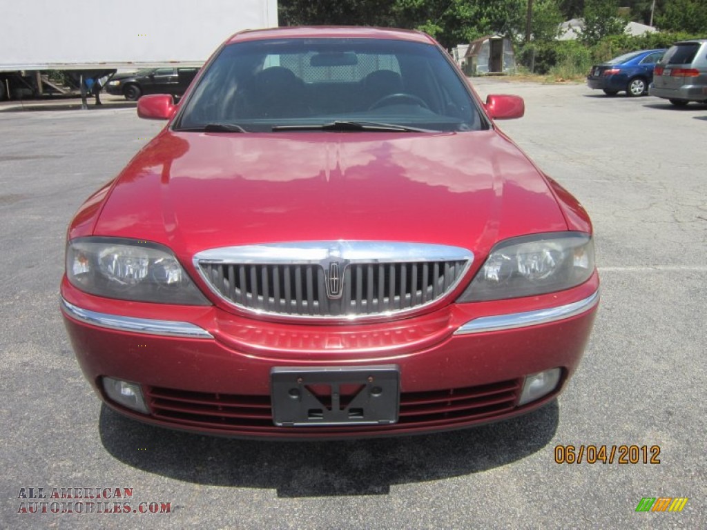 Vivid Red Metallic / Black Lincoln LS V6 Luxury