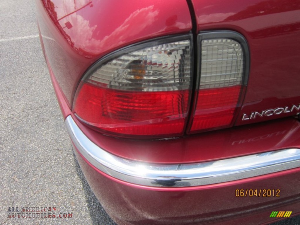 2005 LS V6 Luxury - Vivid Red Metallic / Black photo #9