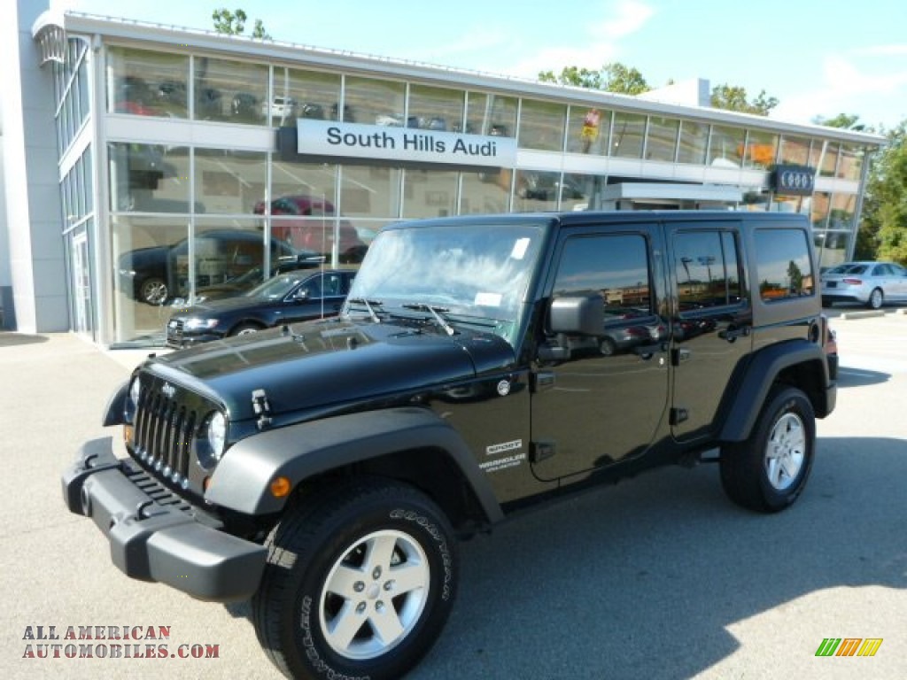 black jeep wrangler with green accents