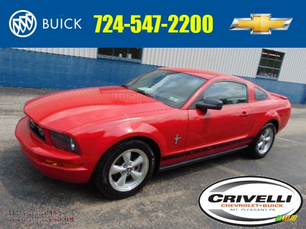 Torch Red / Dark Charcoal Ford Mustang V6 Deluxe Coupe