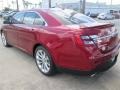 Ford Taurus Limited Ruby Red Metallic photo #14