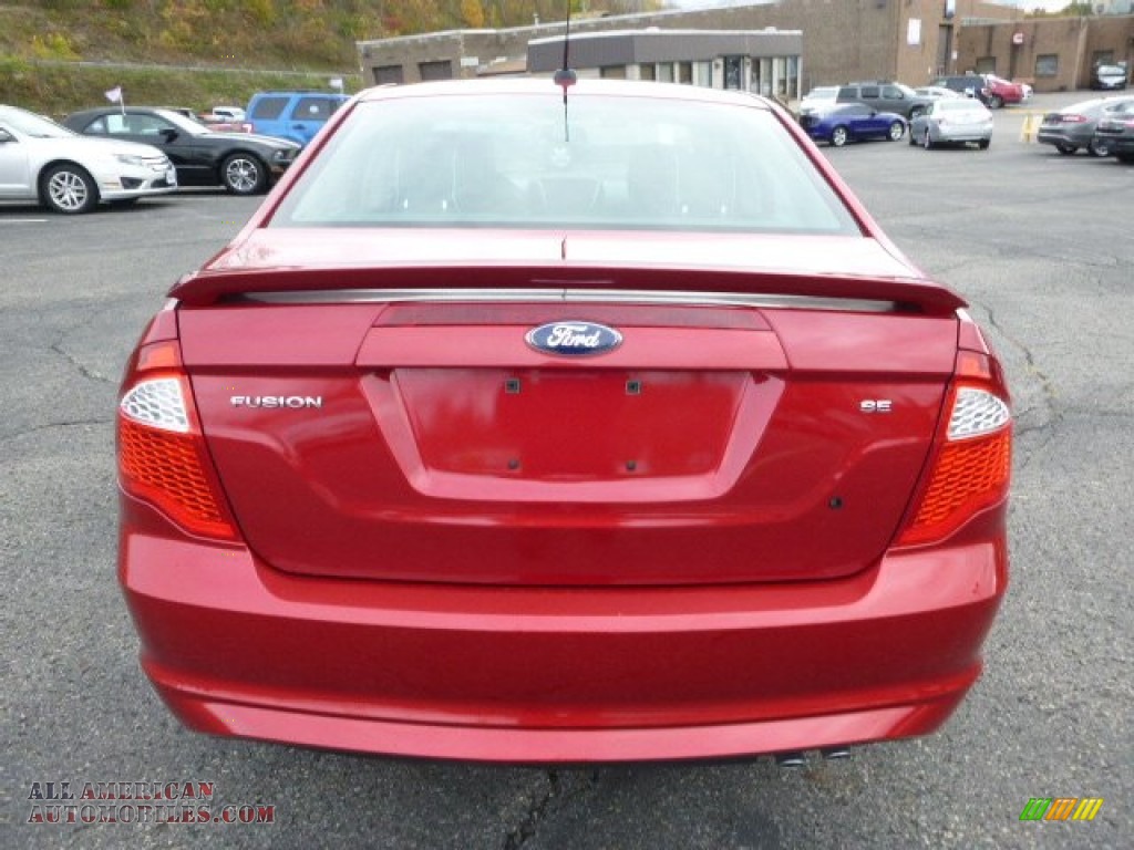 2012 Fusion SE - Red Candy Metallic / Charcoal Black photo #3