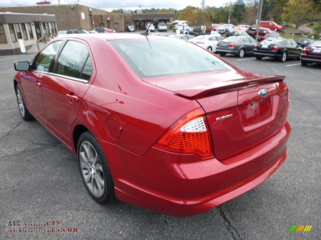 2012 Fusion SE - Red Candy Metallic / Charcoal Black photo #4