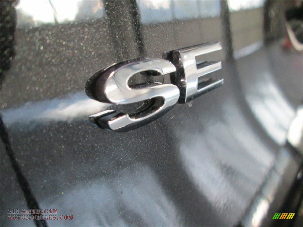 2015 Fiesta SE Sedan - Tuxedo Black Metallic / Charcoal Black photo #7