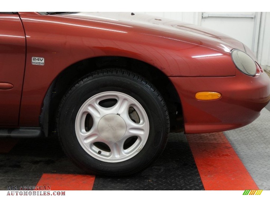 1999 Taurus SE - Toreador Red Metallic / Medium Graphite photo #38