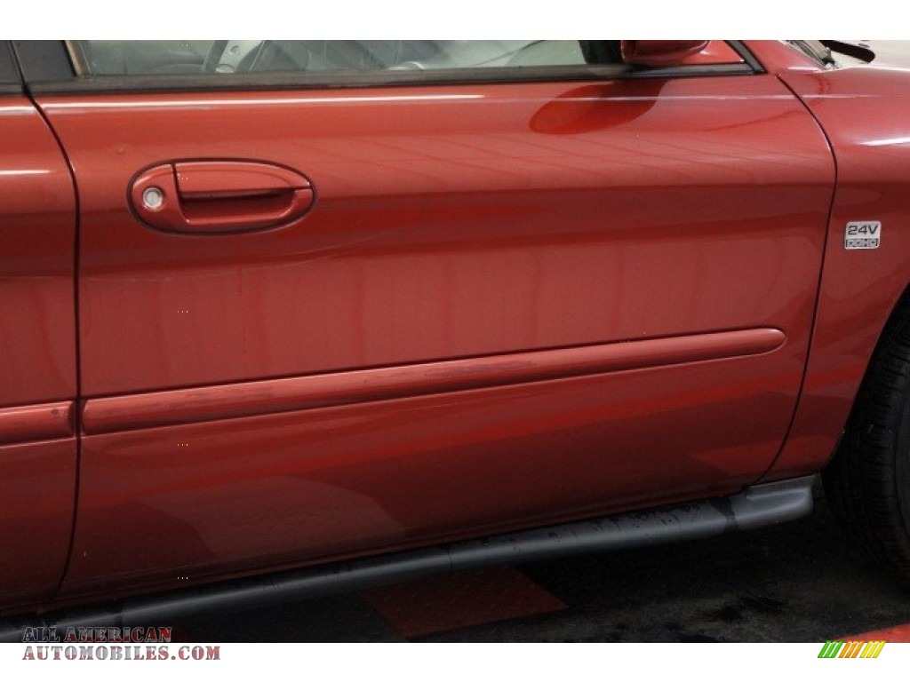 1999 Taurus SE - Toreador Red Metallic / Medium Graphite photo #43