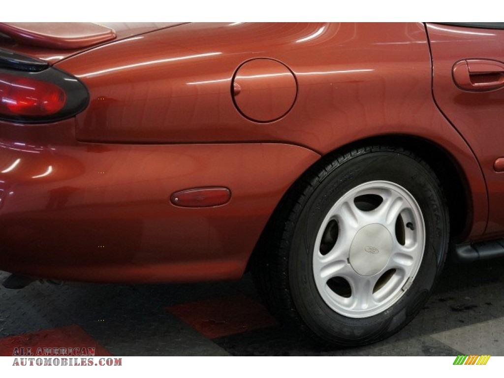 1999 Taurus SE - Toreador Red Metallic / Medium Graphite photo #45