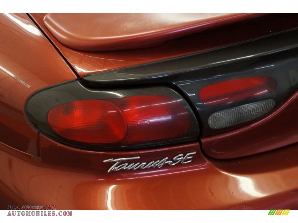 1999 Taurus SE - Toreador Red Metallic / Medium Graphite photo #49