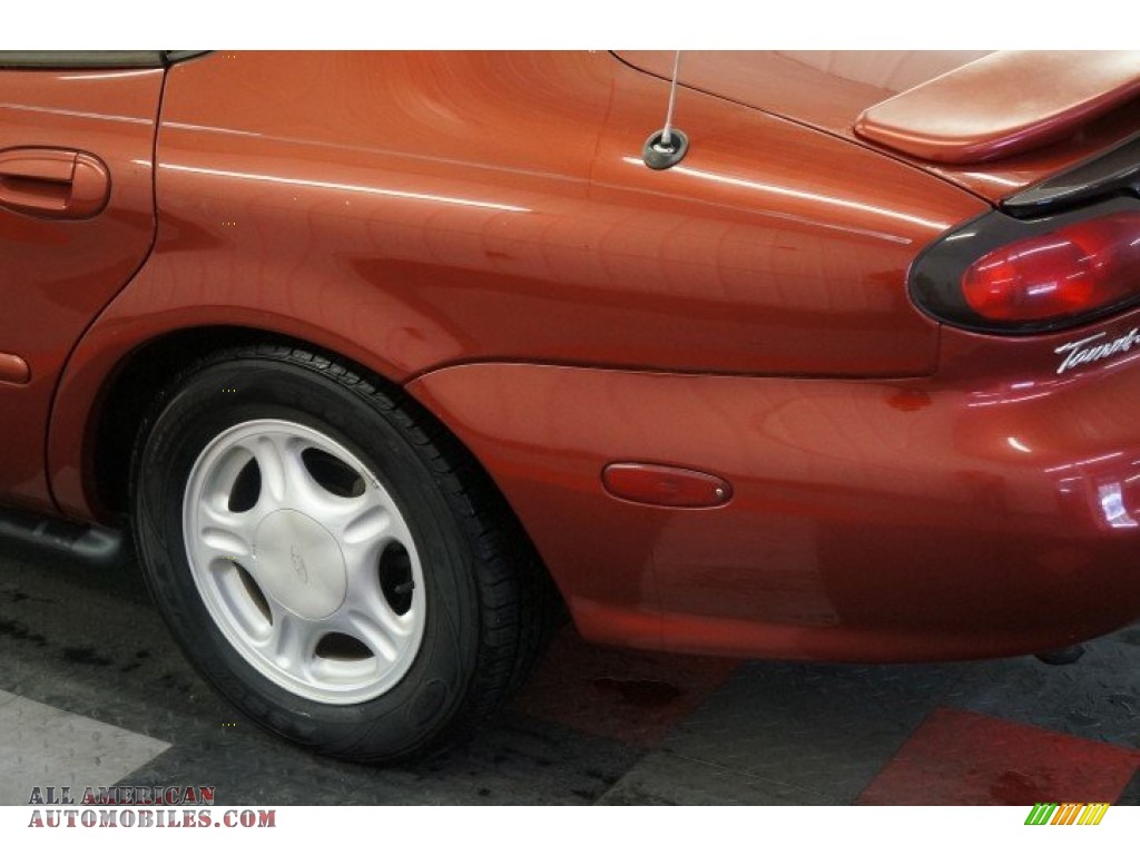 1999 Taurus SE - Toreador Red Metallic / Medium Graphite photo #50