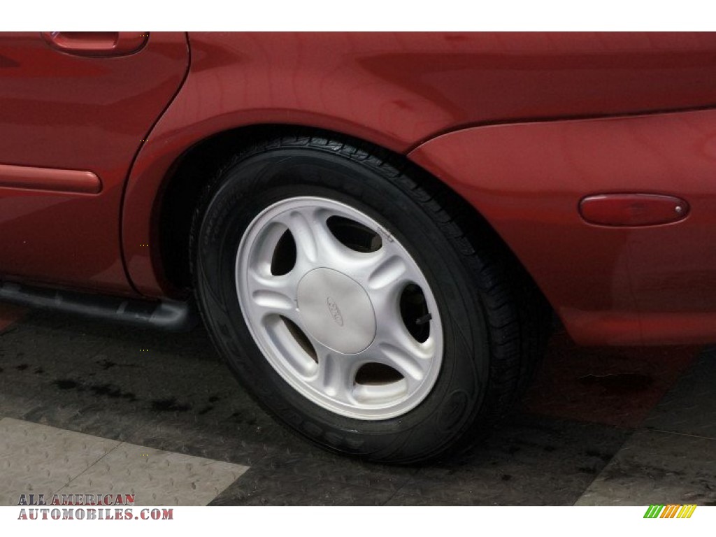 1999 Taurus SE - Toreador Red Metallic / Medium Graphite photo #51