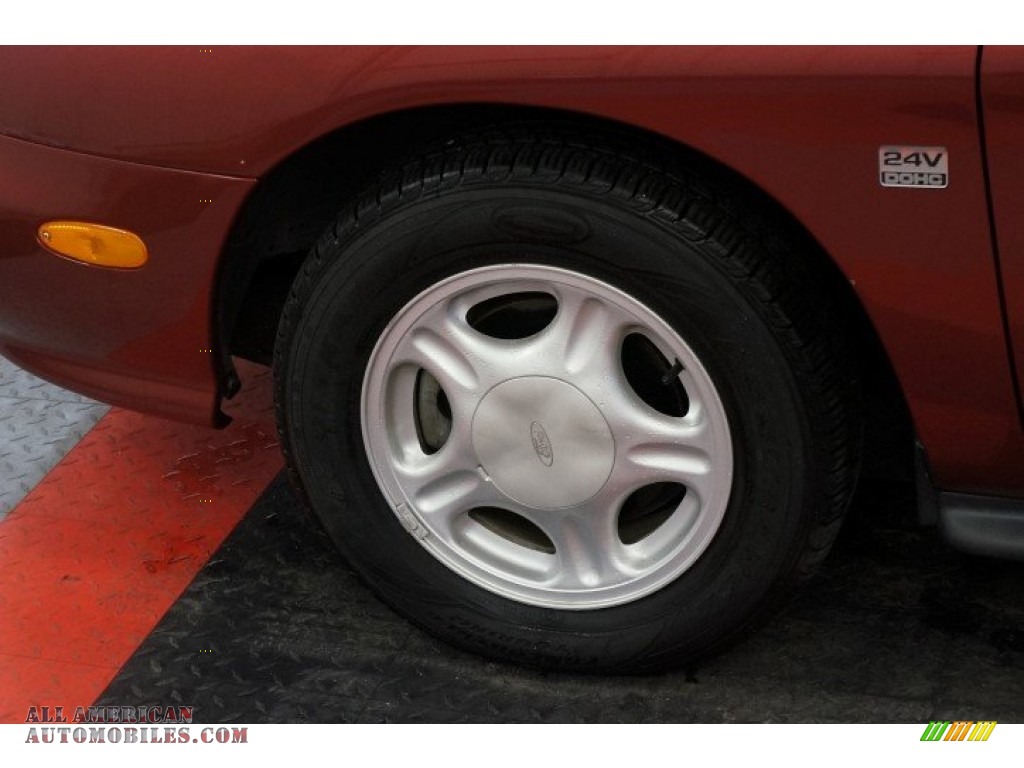 1999 Taurus SE - Toreador Red Metallic / Medium Graphite photo #58